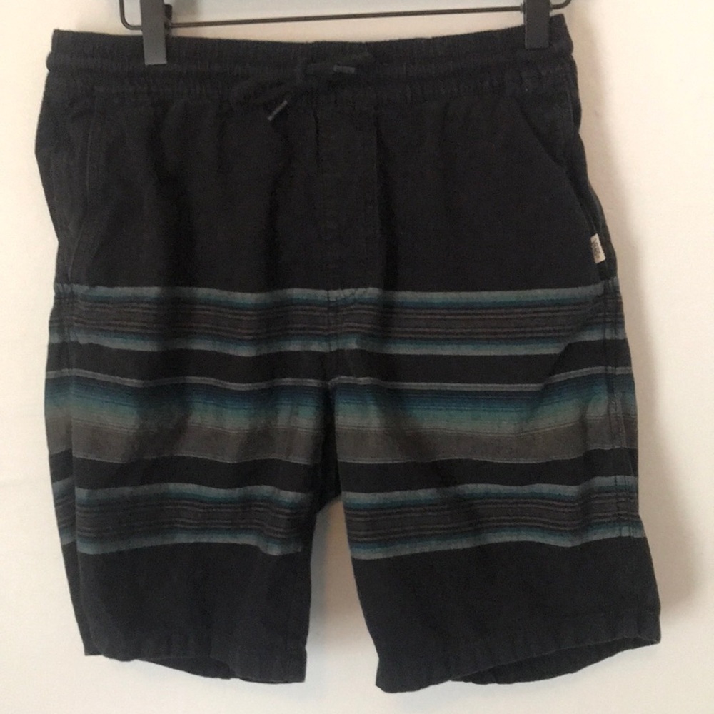 Van’s shorts size Medium stretchy waistband 2 side pockets and 2 back pockets.